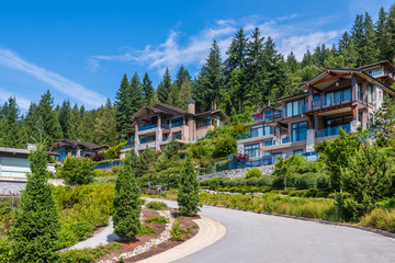 Houses in suburb at Summer in the north America. Luxury houses with nice landscape.