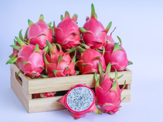 Wall Mural - dragon fruit in basket on white background