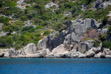 ruins of the ancient city of Kekova on the shore.