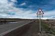 slippy road sign, asphalt highway