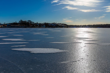 Frozen sea in Naantali Finland. Beautiful  sunny winter day with blue sky.