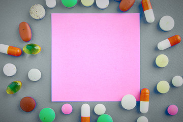 Sticker - Assortment of pills, tablets and capsules on table