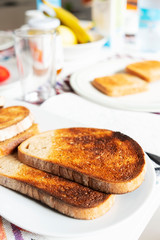 Wall Mural - toasts on a table set for breakfast or dinner.