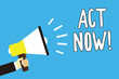 Conceptual hand writing showing Act Now. Business photo text Having fast response Asking someone to do action Dont delay Man holding megaphone loudspeaker blue background speaking loud