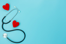 Table Top View Aerial Image Of Accessories Healthcare & Medical With Valentines Day Background Concept.telescope With Colorful Heart Shape On Blue Paper.Flat Lay Items For Doctor Using Treat Patient.