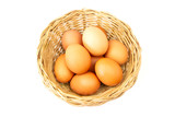 Fototapeta Dziecięca - Fresh brown eggs in basket isolated on white background.