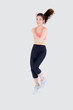 © NT_studio - Beautiful young asian woman happy and smiling jogging isolated on white background, asia girl cheerful in sport is activity exercise cardio and workout with running for healthy, health concept.