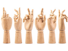 Hand Of Wood Doll Make Fingers To Touch On White Bakground