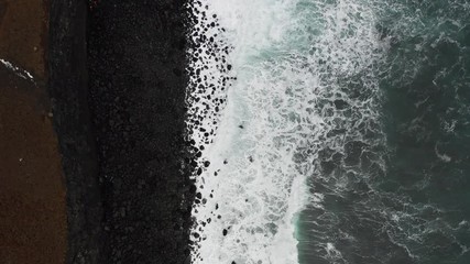 Wall Mural - overhead drone shot of black cliffs and rocky coastline in iceland, beautiful landscape scandinavia
