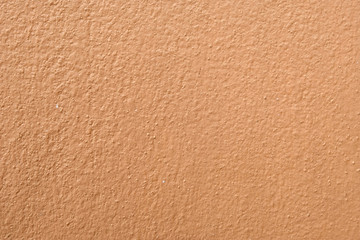 Wall Mural - Brown cement wall background close up