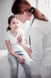 © zinkevych - Cute young girl looking at the doctor