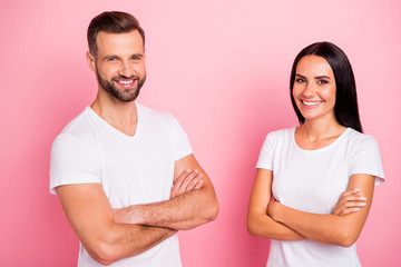 Poster - Portrait of his he her she two nice attractive lovely cheerful cheery spouses folded arms idyllic harmony match isolated over pink pastel background