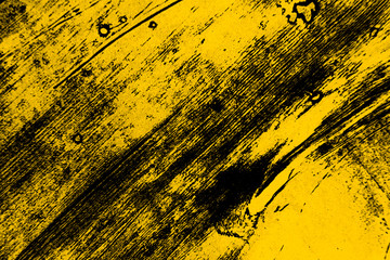 Wall Mural - yellow and black paint  background texture with brush strokes