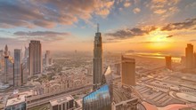 Amazing Sunrise Aerial View Of Dubai Downtown Skyscrapers Morning Timelapse With Haze, Dubai, United Arab Emirates. Modern Towers And Construction Site