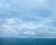 canvas print picture - seascape with cloudy sky over sea