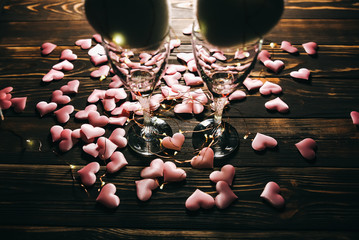 Wall Mural - Hearts with wine glasses. Romantics love concept. Festive background. Valentines day postcard. Lights and lamps.