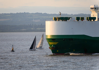 Ship and yachts near miss collision