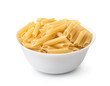 Bowl of uncooked penne lisce pasta