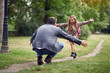 © luckybusiness - schoolgirl running to dad to give him a hug