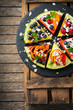 Watermelon pizza with berries, fruits, yogurt, feta cheese