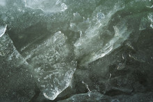 Background With Clear Green Ice On Lake