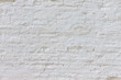 Old white whitewashed brick wall