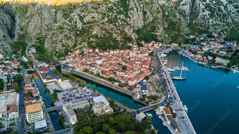 Aerial view of Kotor or Cattarois a coastal town in Montenegro located in a secluded part of the Gulf of Kotor. - obrazy, fototapety, plakaty 