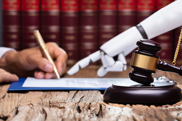 Robotic Hand Assisting Person For Signing Document