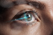 © LIGHTFIELD STUDIOS - close up view of human eye with data illustration, robotic concept