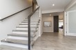 © Jose Soriano/Wirestock - Beautiful shot of a modern house staircase and the hall