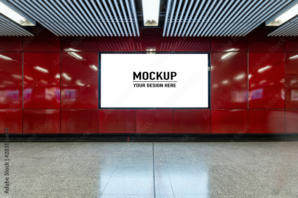 Blank billboard located in underground hall or subway for advertising, mockup concept, Low light speed shutter - obrazy, fototapety, plakaty 