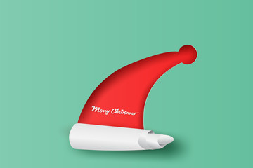 Wall Mural - merry christmas and happy new year typographic on red background. santa claus hat with roll up paper