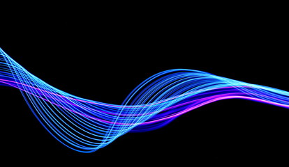 long exposure, light painting photography. vibrant streaks of neon blue and pink color against a bla