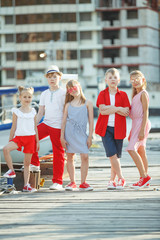 Fashionable children by the sea. Children's fashion. 