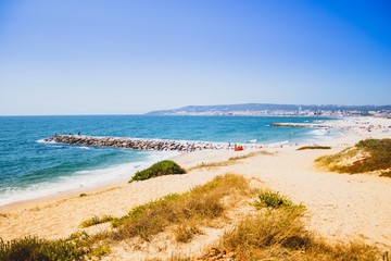 Figueira da foz beach Portugal. Summer day in Europe. Boho style coloured style photo.  Over processed.