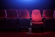 Row Of Empty Red Cinema Seats