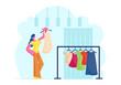 © Pavlo Syvak - Young Woman Try On Fashioned Dress in Store