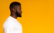 © Prostock-studio - Profile portrait of serious african american man