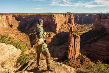 Wall Mural - a hiker in the canyon de chelly national monument