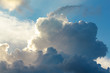 large cumulus, nimbus clouds with silver lining, in blue, and white