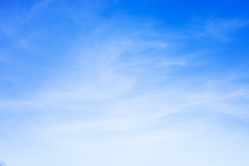 Wall Mural - blue sky background and white clouds soft focus, and copy space