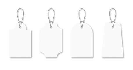 Set of blank white tags with rope. White shopping labels and price tags in different shapes. Mockup and template for paper price tag