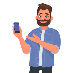 Man shows the smartphone the screen forward. Advertising or presentation of a mobile application