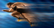 © Andrey Burmakin - Sporty woman running. Blurred effect