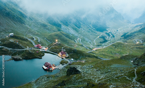 Fotomural Balea lake in Fagaras mountain, Romania. evening landscape