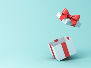 open gift box or present box with red ribbon and bow isolated on green blue pastel color background 