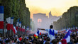 PARIS, France – July 15, 2018 : thousands of jubilant french fans on the Avenue des Champs-Élysées celebrating France's victory over Croatia in the 2018 FIFA World Cup Final.