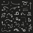 © mikabesfamilnaya - Infographic elements on isolated black background. Hand drawn wavy arrows. Line art. Set of different pointers. Abstract indicators. Black and white illustration