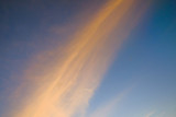 Fototapeta Na ścianę - Flying and traveling, view from airplane window on the wing on sunset time