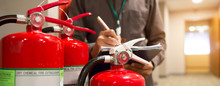 Fire Extinguishers, Engineers Are Checking Fire Extinguishers.